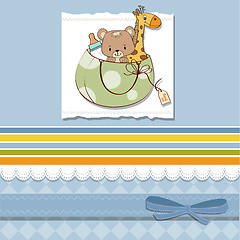 Image showing new baby announcement card with bag and same toys