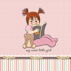 Image showing sweet little girl reading a book