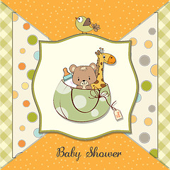 Image showing new baby announcement card with bag and same toys