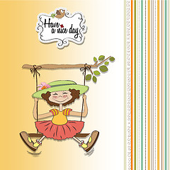 Image showing funny girl in a swing