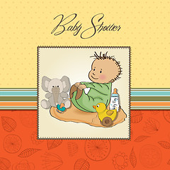 Image showing little baby boy play with his toys
