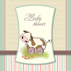 Image showing Baby shower card with cute cow toy