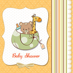 Image showing new baby announcement card with bag and same toys