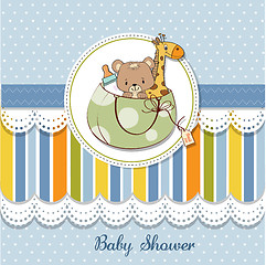 Image showing new baby announcement card with bag and same toys