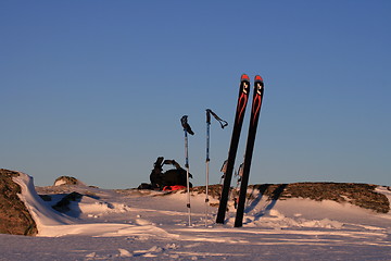 Image showing skis on the horizon