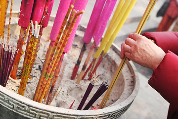 Image showing Lighting incense