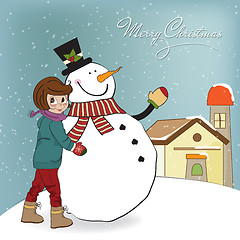 Image showing Cute little girl with snowman