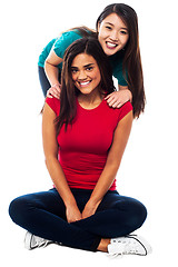 Image showing Young smiling girls posing for the camera