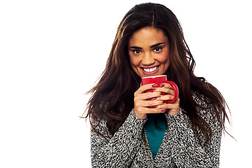 Image showing Relaxed mixed race woman having coffee