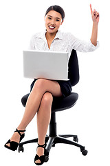 Image showing Attractive woman working on laptop