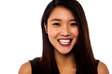 Image showing Smiling asian girl with beautiful long hair