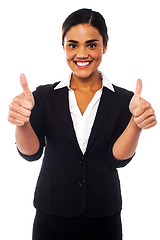 Image showing Attractive woman showing double thumbs up