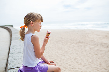 Image showing Girl with ice cream near beach