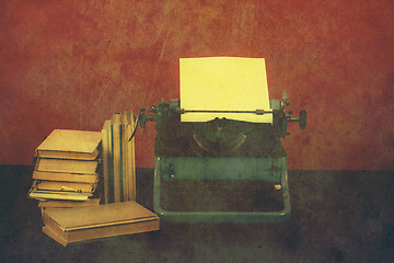 Image showing Old typewriter with books retro colors on the desk