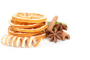 Image showing Dried orange, Star Anise, cinnamon and and green leave