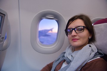 Image showing woman in airplane travel