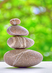 Image showing stone pyramid over natural background