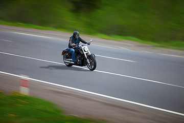 Image showing Man traveling on a classic motorcycle - chopper