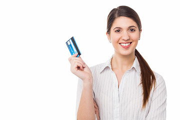 Image showing Smiling elegant woman holding credit card