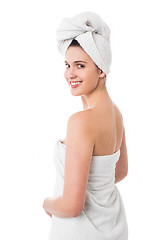 Image showing Spa woman turning back and smiling