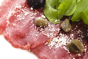 Image showing Beef carpaccio with rucola and parmesan 