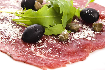 Image showing Beef carpaccio with rucola and parmesan 