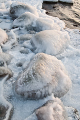 Image showing The marine stones covered by an ice, close up