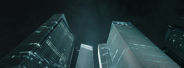 Image showing Office buildings exterior at night - modern business architectur