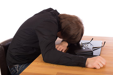 Image showing Business man sleep on his laptop