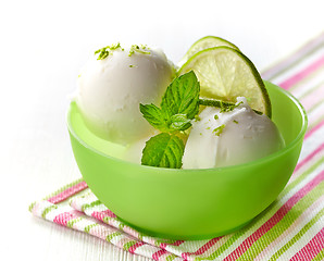 Image showing bowl of fresh lime sorbet decorated with lime and mint