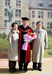 Image showing South Korean university graduate with his parents - EDITORIAL ON