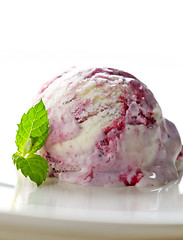 Image showing scoop of fruit ice cream on white plate