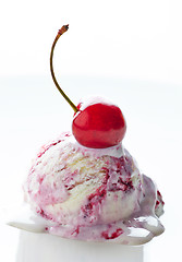 Image showing scoop of fruit ice cream on white background