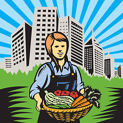 Image showing farmer-female-harvest-building