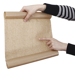 Image showing Hand holdong a paper.