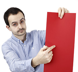 Image showing Man holding a paper