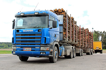 Image showing Scania 420 Logging Truck with Wood Trailers