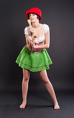 Image showing Pretty girl in german style with ice cream