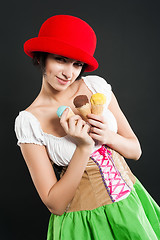 Image showing Pretty girl in german style with ice cream