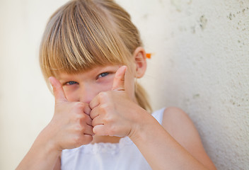 Image showing Young girl doing ok sign