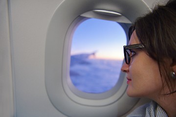 Image showing woman in airplane travel
