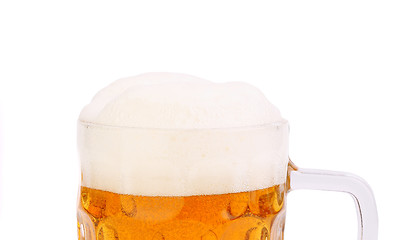 Image showing Top froth on the mug of beer isolated on white