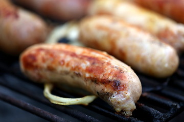 Image showing A grilled sausage close up, barbecue