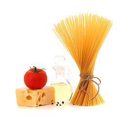 Image showing Bunch of spaghetti pasta, fresh tomatoes, cheese, bottle of oil and pepper