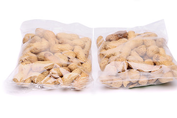 Image showing Two large plastic bags of peanuts