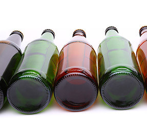 Image showing bottles lying in row