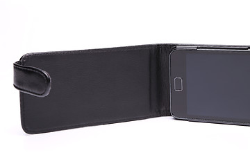 Image showing Mobile phone in its case over white background