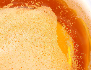 Image showing Glass of beer, top view close-up.