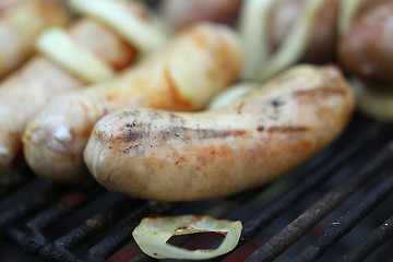 Image showing BBQ sausage with onion