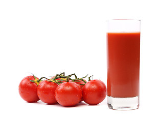Image showing Cluster of Tomatoes and a glass of juice